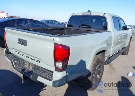 2023 Toyota Tacoma Trd Sport from USA, damaged, VIN 3TYDZ5BN8PT029402